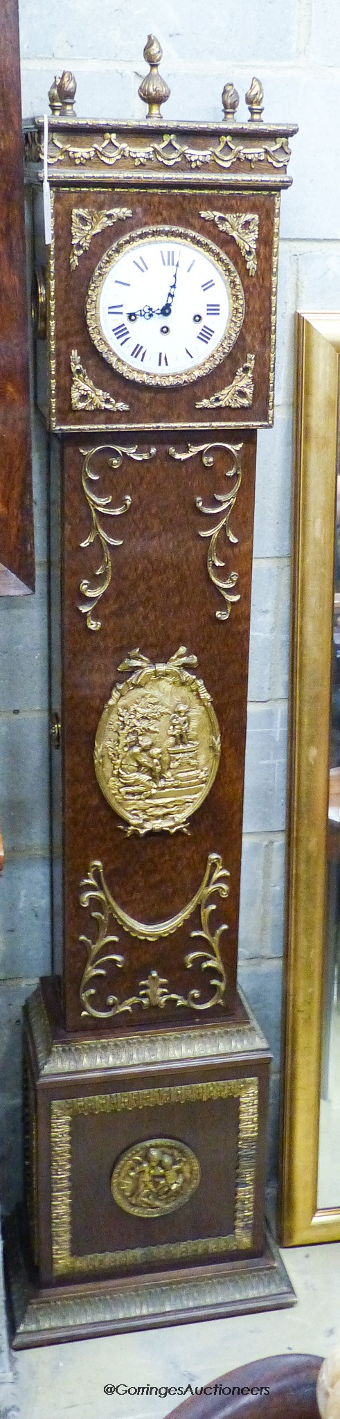 A reproduction gilt metal mounted longcase clock, height 184cm